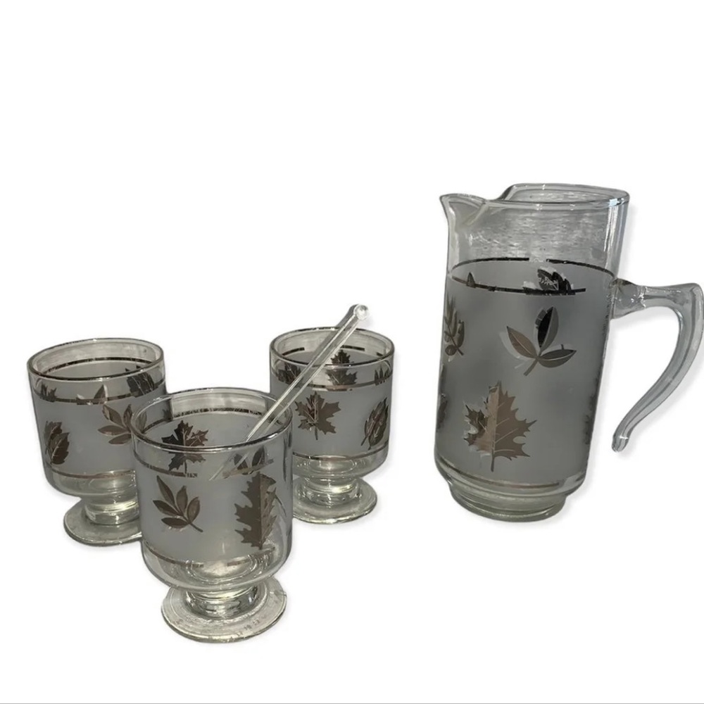 Vintage pitcher and glasses set with a stirrer. Possibly Libbey.